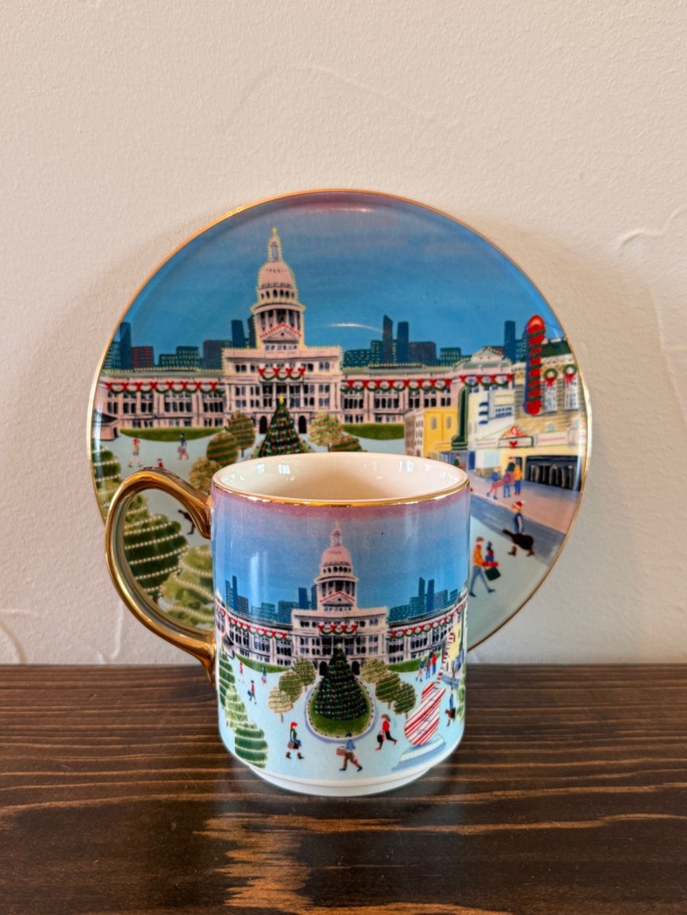 anthropologie seasons greetings mug and plate: austin 2024